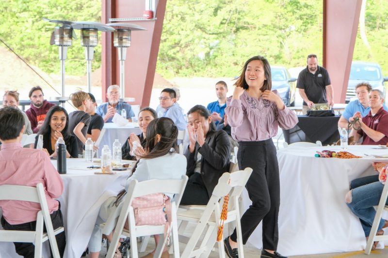 A student getting up to receive an award at the annual FST Awards Banquet