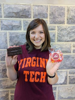 Alexis Hamilton holding up VT Food Science branded candy