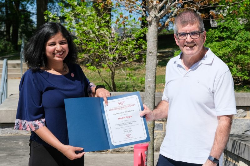 Madhvi Singh receiving Outstanding 1st Year Grad Student 