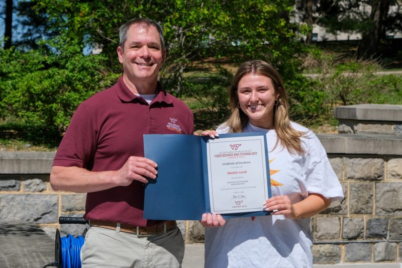 Natalie Lucidi receiving her award