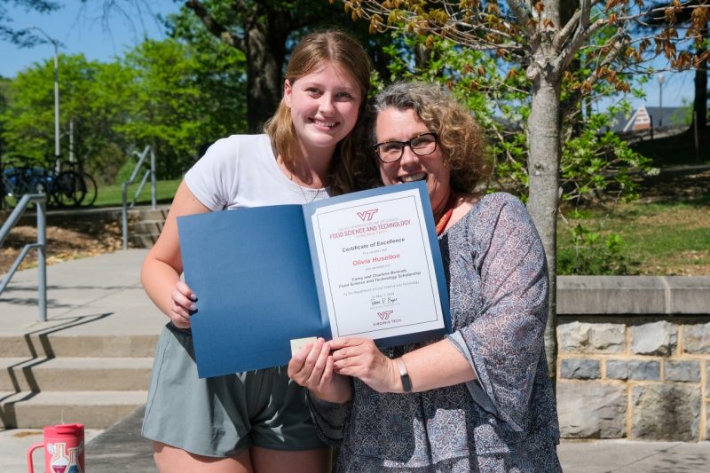 Liv Huselton receives her award