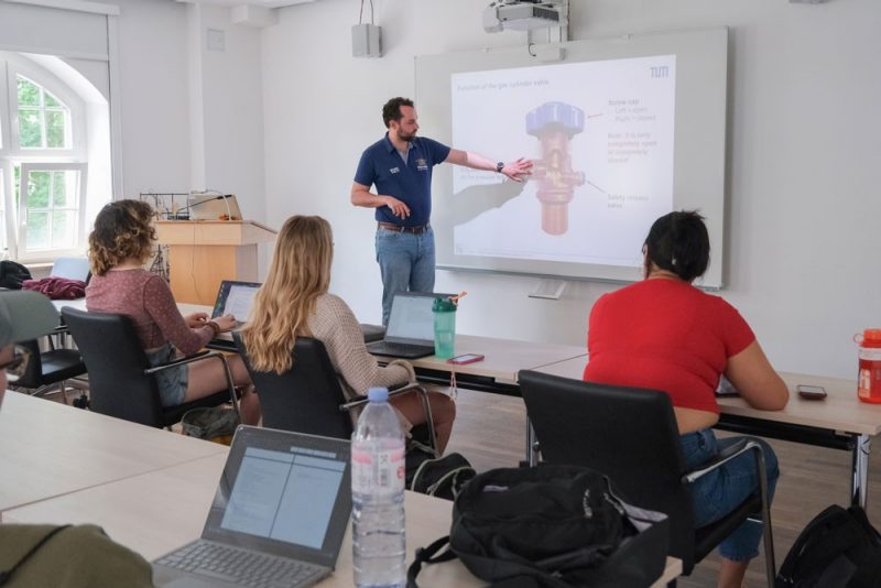 Teacher instructing students in the classroom