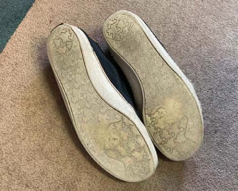 Figure 3. A pair of shoes flipped upside down to show its minimal tread.